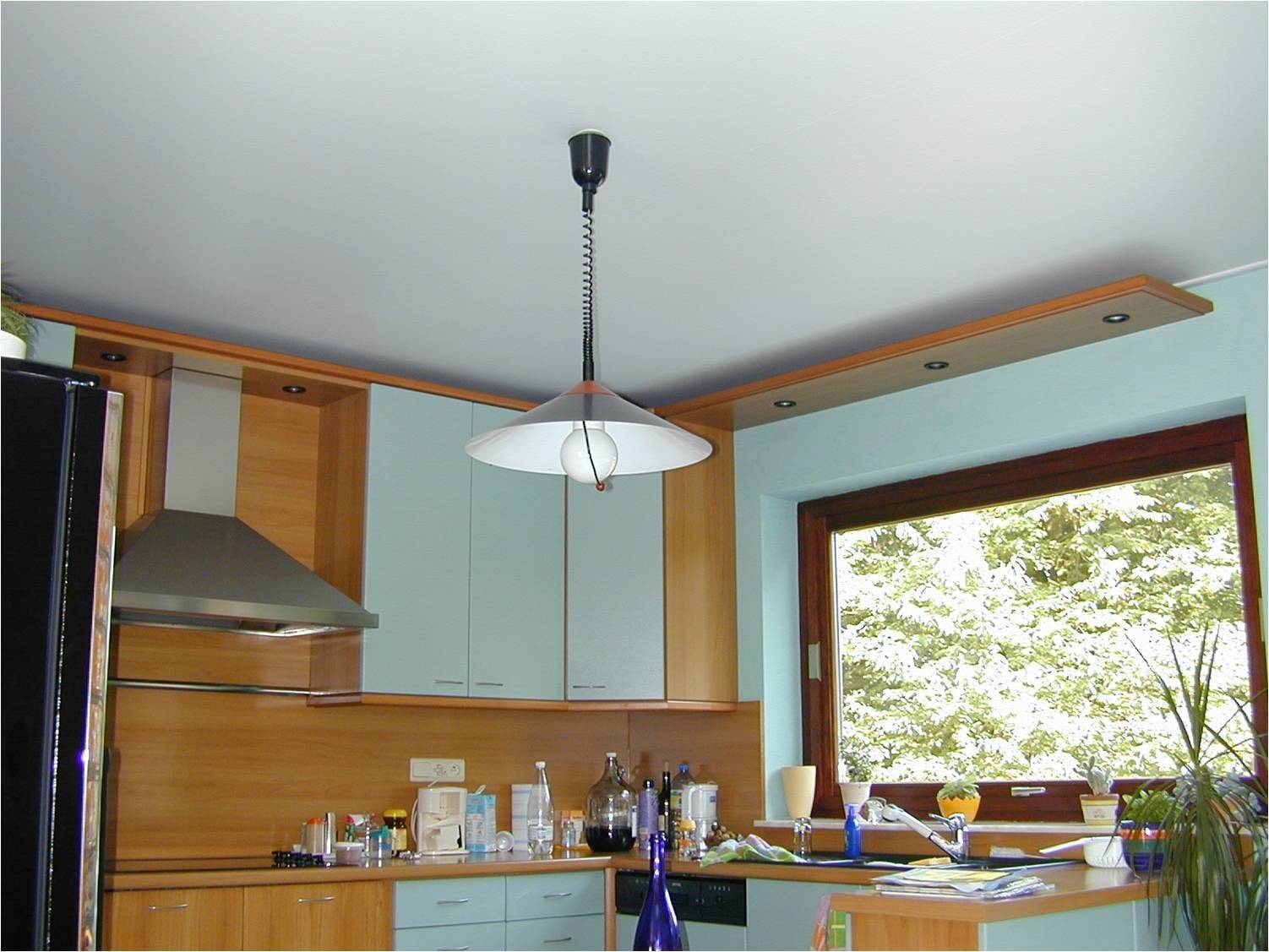 Какой потолок сделать на кухне: обзор и сравнение