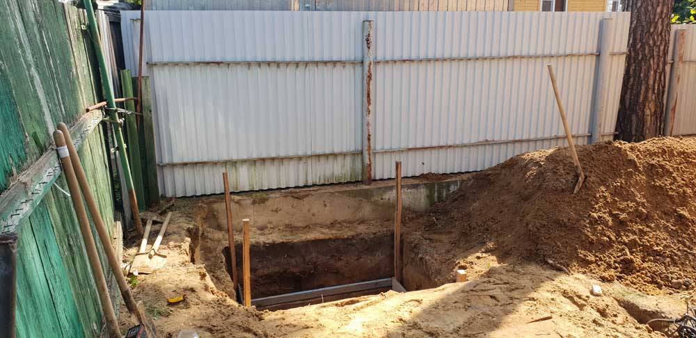 Как обустроить выгребную яму при высоком уровне грунтовых вод